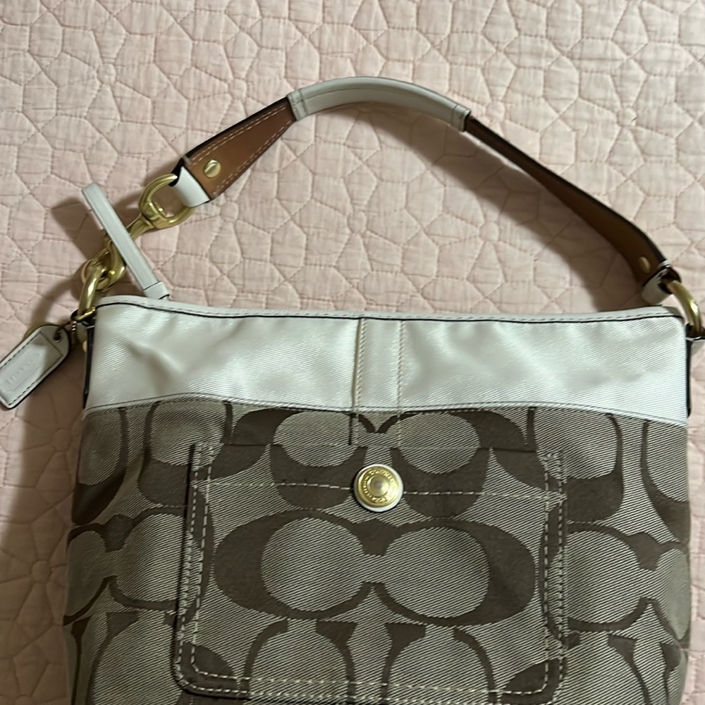Coach bag 12 inch wide and 9 inches long